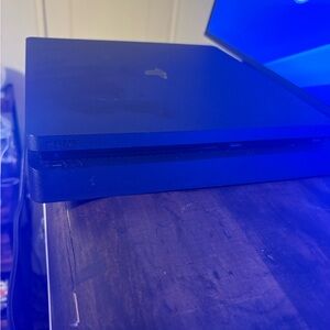 Sony Gaming Console with 2 games and controller